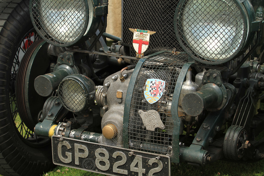 IMG 5082 
 Bentley racing car, Reg GP 8242, supercharger detail shot. 
 Keywords: Bentley Racing Car Supercharger Reg GP 8242 Headlights Classic British Green Race Touring Badges